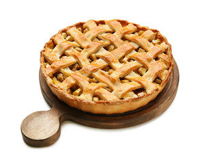 Wooden board with tasty homemade apple pie on white background