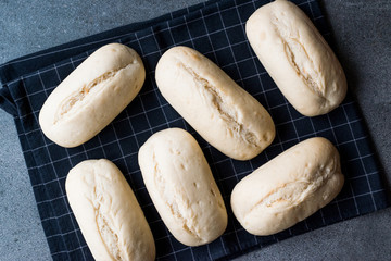 Raw Baguette Bread Ready to Bake in the Oven.
