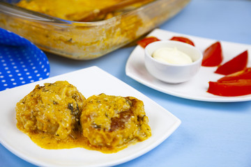 Delicious cutlets with tomato sauce