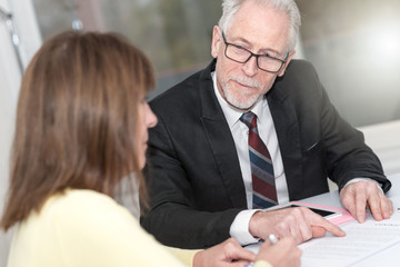 Woman meeting a consultant for advices, light effect