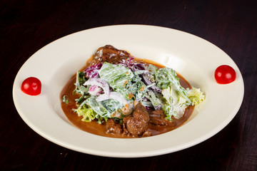 Beef with iceberg salad