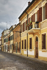 Fototapeta na wymiar Old street in Ferrara. Italy