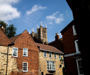 Naklejka premium A spire of Lincoln Cathedral as seen from halfway up Steep Hill