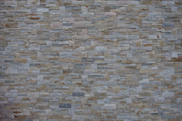 Beige stone wall background