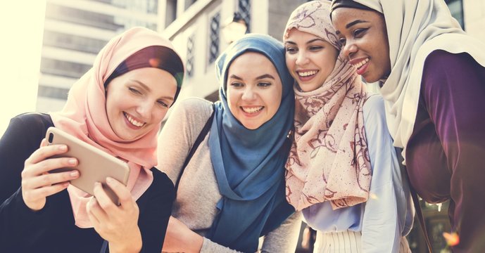 Group of islamic women taking selfie together