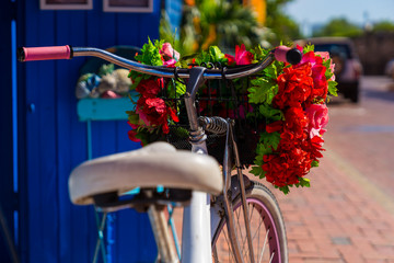 Bicycle with flower bouquet in the streets of Cartagena