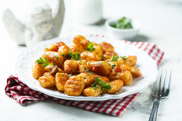 Homemade potato gnocchi with tomato sauce