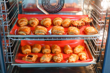 French sweet pastries in a professional oven - 216117691