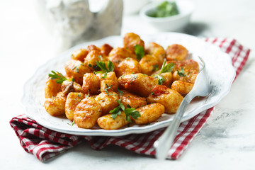 Homemade potato gnocchi with tomato sauce