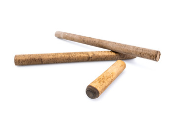 Ebonite sticks on white background. Also is known as hard rubber or vulcanite. Serves as a material for making decoration or other products
