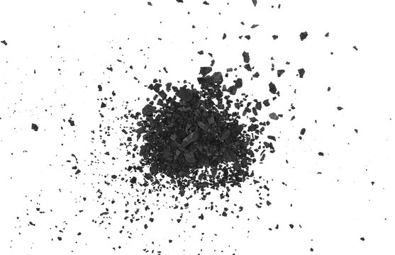 Black coal pile, dust isolated on white background, top view
