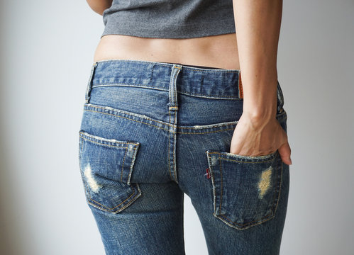 Woman wearing of jean pants, behind, Health concept.