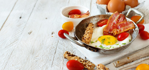 Breakfast with fried eggs and bacon - Continental breakfast