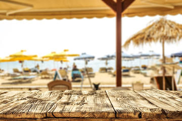 desk of free space and summer bar on beach. 