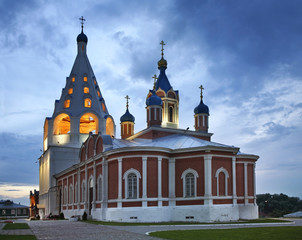 Fototapeta na wymiar Cathedral bell tower and church of Icon of Mother of God of Tikhvin in Kolomna Kremlin. Russia