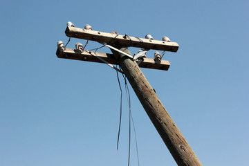 Old wooden electric pole