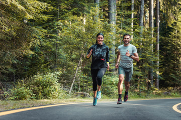 Couple running outdoors