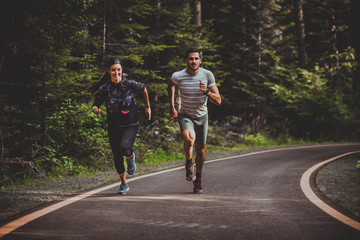 Couple running outdoors