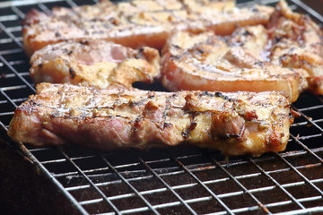 delicious food pork grilling on hot charcoal