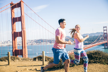 Couple running in San Francisco