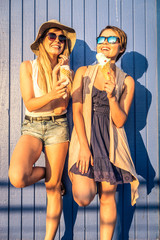 Two girls eating ice-cream