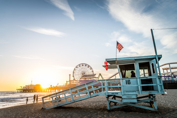 Santa Monica pier at sunset - obrazy, fototapety, plakaty