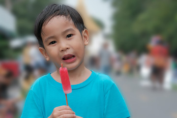 a boy eating ice cream