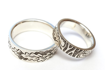 Silver engagement rings with engraving according to the author's sketch.