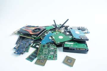 Pile of Computer Hardware part electronic waste isolated on white background