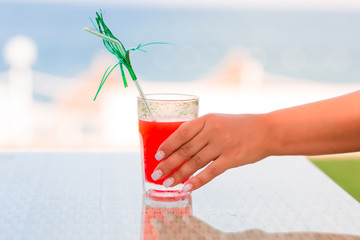 Cocktail glasse on the table at the sea side