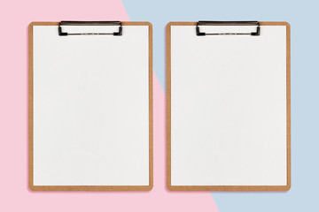 Two clipboard with white sheet on pastel color background, Minimal concept