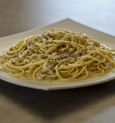 Spaghetti Pasta Cacio e Pepe (Cheese and Pepper). Typical Roman Cuisine