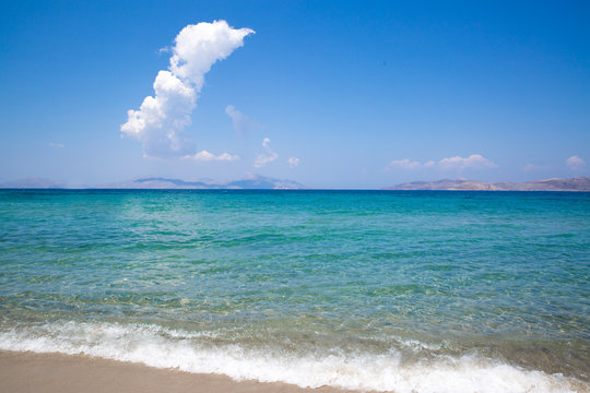 Kos, Marmari beach, Greece. Beautiful aegean sea and white sand. Transparent azur emerald turqouise water of mediterranean sea, dodecanese (dhodhekanisos).