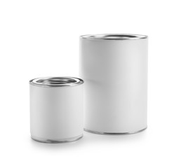 Cans of paint on white background