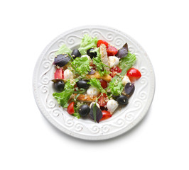 Plate with delicious chicken salad on white background
