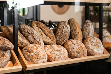 Counter with assorted fresh bread in bakery