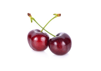 whole fresh cherry with stem on white background