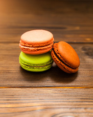 Ccolorful Macaroons on wooden background