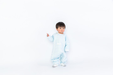 Infant child baby girl kid toddler in diaper make first steps isolated on a white background