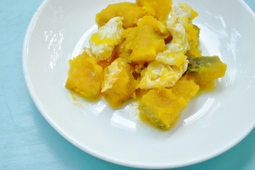 stir fried pumpkin with egg on plate