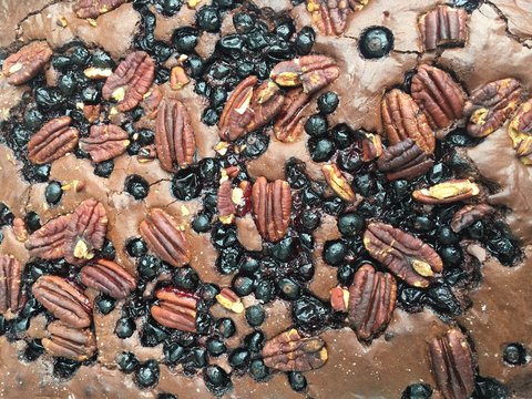 Chocolate brownie with pecans and blackcurrants