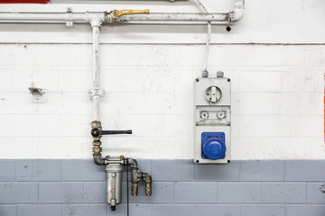 abandoned old industrial interior detail at wall