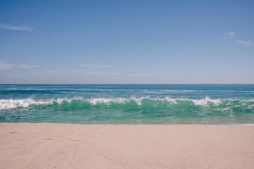 Waves breaking on beach, Australia