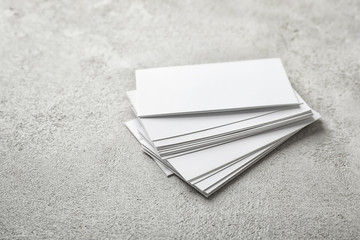 Blank business cards on light background