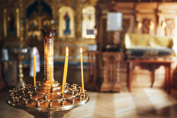 Burning candles in the Orthodox Church