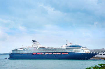 Cruise liner under rainy sky