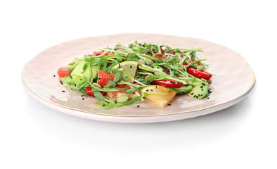 Plate with delicious fresh salad on white background