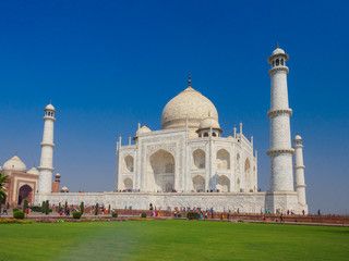 Fototapeta na wymiar The Taj Mahal, the ivory-white marble mausoleum in the city of Agra, which was commissioned in 1632 by the Mughal emperor, Shah Jahan, to house the tomb of his queen, Mumtaz Mahal.