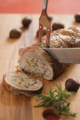 stuffed turkey breast on cutting board