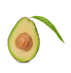 Half of ripe avocado with leaf on white background